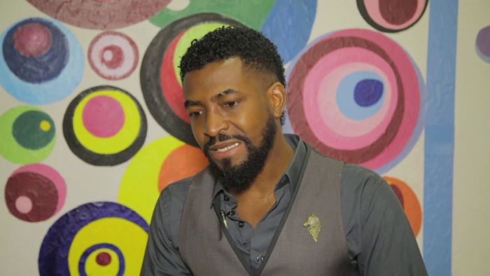 ADEDOYIN CELEBRATES AWARD